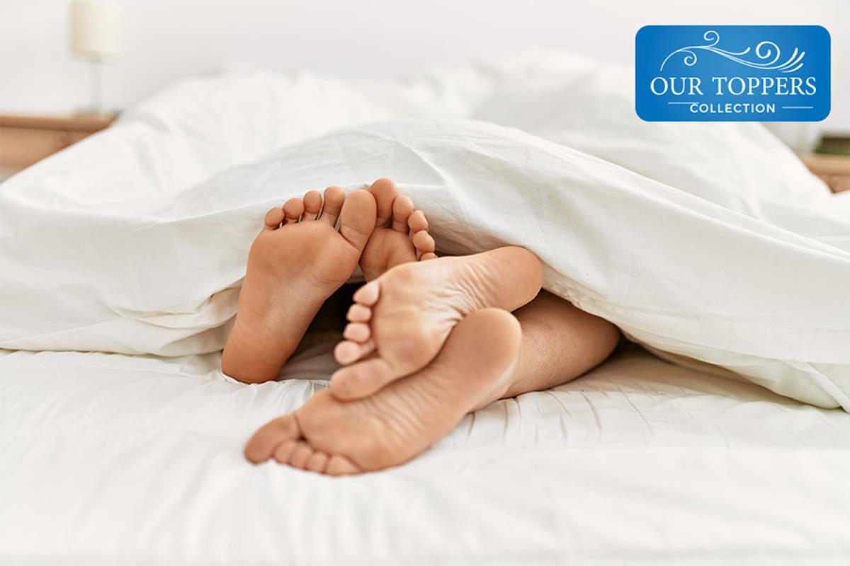 woman stretching on top of comfy looking mattress company mattress